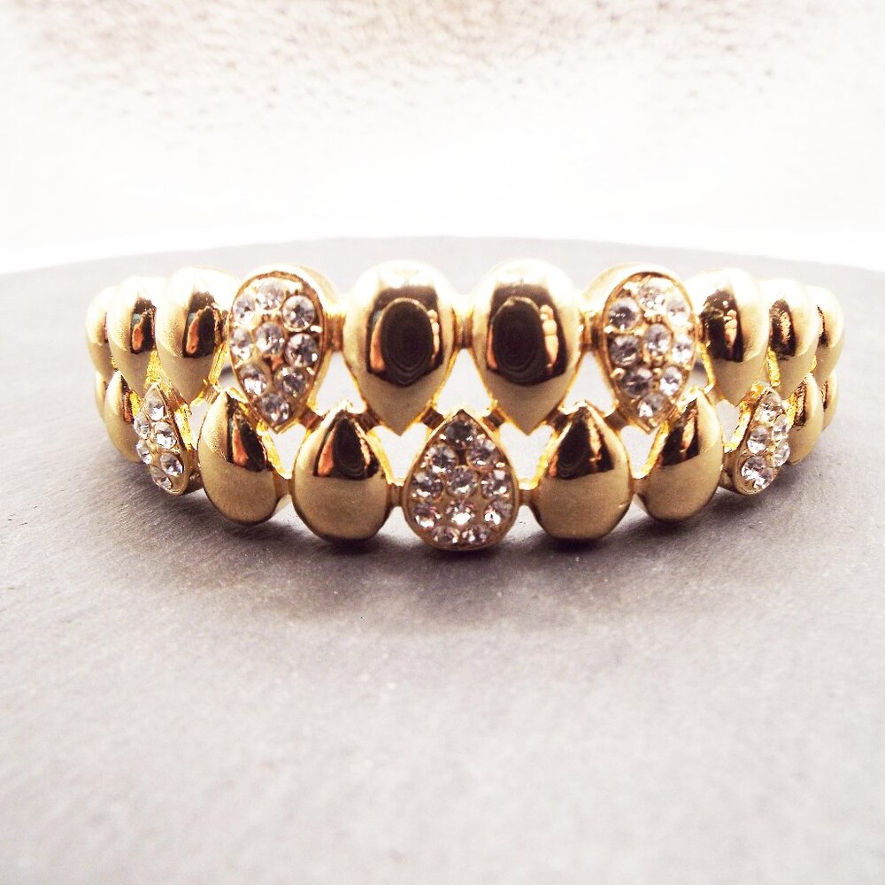 BRIGHT GOLDEN TEARDROPS W/ ALTERNATING CRYSTAL SET "TEETH" HINGED BRACELET C1